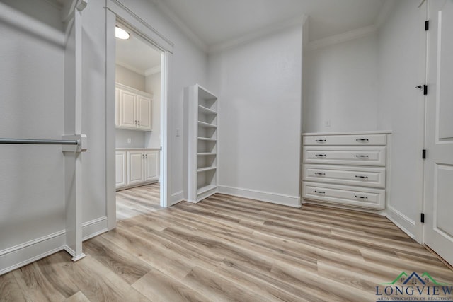 spacious closet featuring light hardwood / wood-style floors