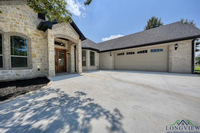 view of front of home featuring a garage