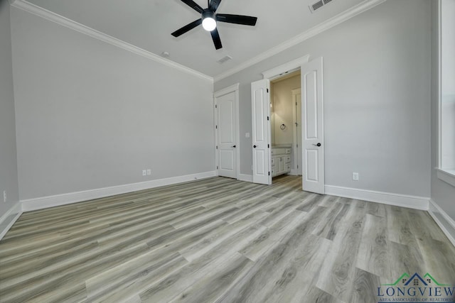 unfurnished bedroom with crown molding, ceiling fan, light wood-type flooring, and ensuite bath