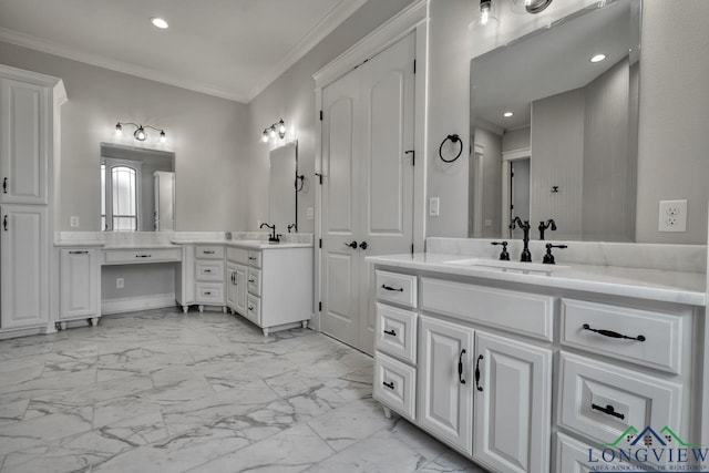 bathroom with ornamental molding and vanity