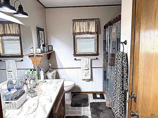 906 Misty Ln, Atlanta, TX 75551 - bathroom featuring vanity, tile patterned flooring, a wainscoted wall, and a shower with curtain