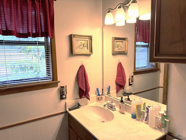 906 Misty Ln, Atlanta, TX 75551 - bathroom featuring plenty of natural light and vanity