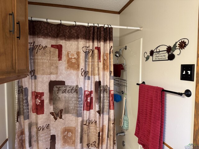906 Misty Ln, Atlanta, TX 75551 - bathroom with shower / bathtub combination with curtain, ornamental molding, and a textured ceiling