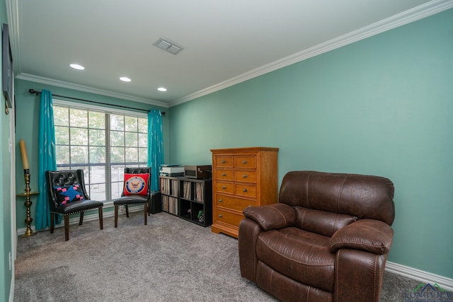 living area featuring crown molding and carpet floors