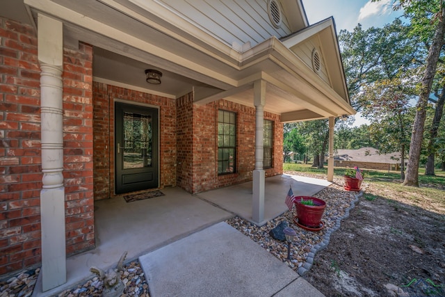 entrance to property with a porch