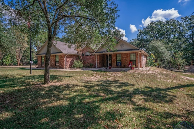 view of front facade with a front yard