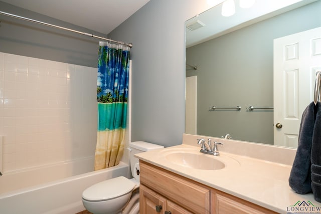 full bathroom with vanity, toilet, and shower / bath combo with shower curtain