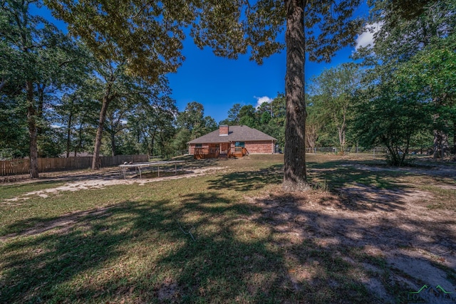 view of yard featuring a deck