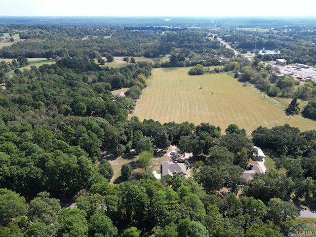 birds eye view of property with a rural view