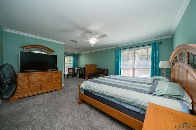 carpeted bedroom with ceiling fan and crown molding