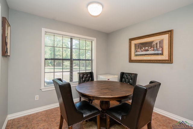 view of tiled dining space