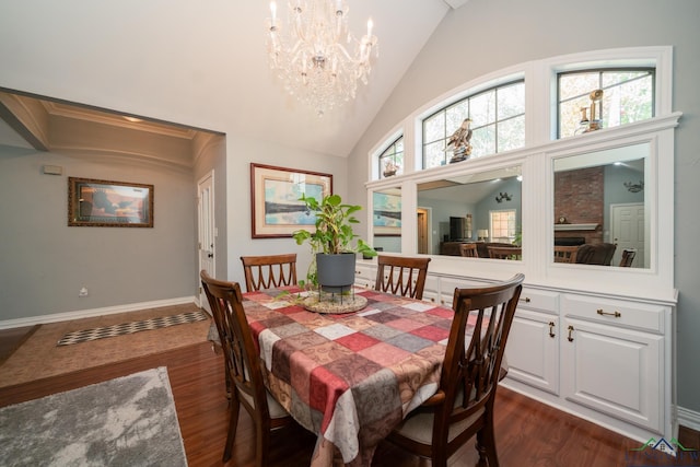 dining space featuring a notable chandelier, dark hardwood / wood-style floors, and lofted ceiling