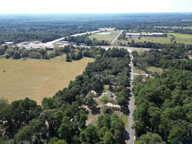 birds eye view of property featuring a rural view