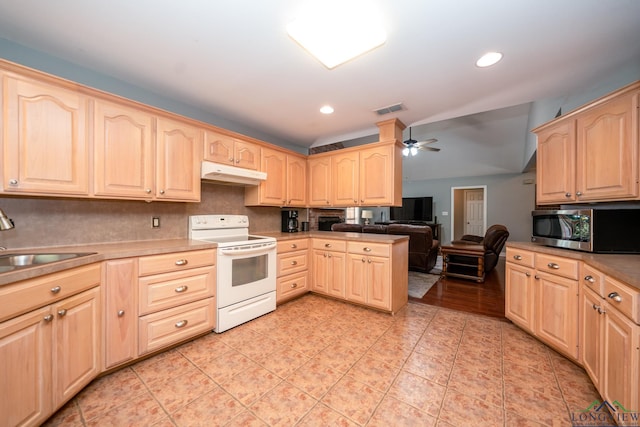 kitchen with ceiling fan, sink, light brown cabinets, white electric stove, and kitchen peninsula