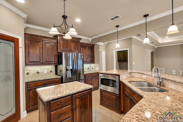 kitchen with visible vents, light tile patterned floors, light stone counters, stainless steel appliances, and a sink