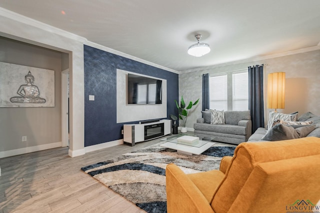 living room with hardwood / wood-style floors and ornamental molding