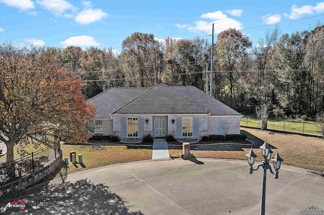 view of front of home with a front yard