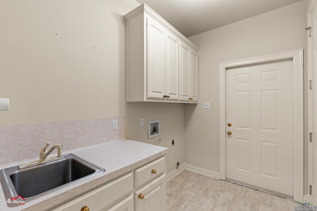 laundry area with cabinets, washer hookup, electric dryer hookup, and sink