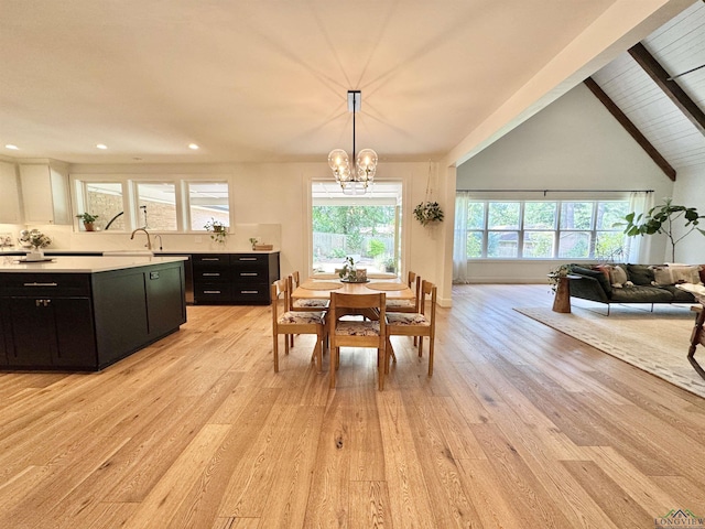 3 Lindsey Ln, Longview, TX 75601 - dining space with light wood-style flooring, a chandelier, beam ceiling, and recessed lighting