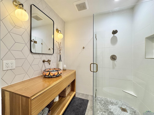 3 Lindsey Ln, Longview, TX 75601 - bathroom featuring a shower stall, tile walls, and vanity