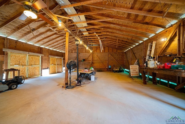 miscellaneous room featuring lofted ceiling