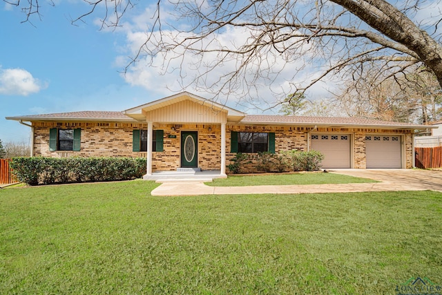 ranch-style house featuring a garage and a front yard