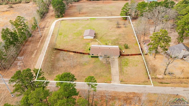 birds eye view of property featuring a rural view