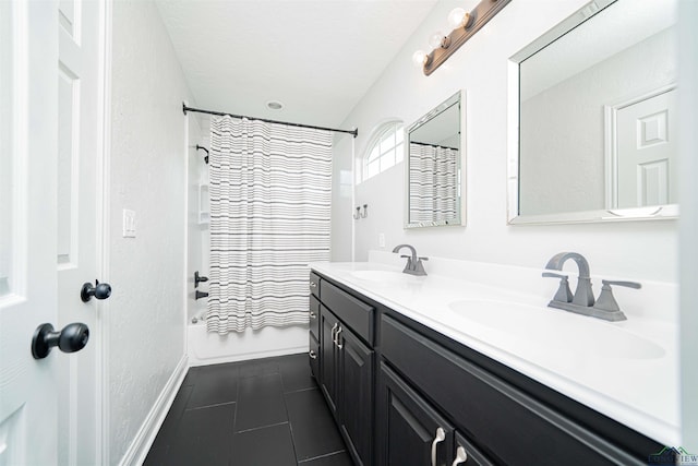1700 Van Zandt Ave, Marshall, TX 75670 - full bathroom featuring double vanity, shower / tub combo with curtain, and tile patterned flooring