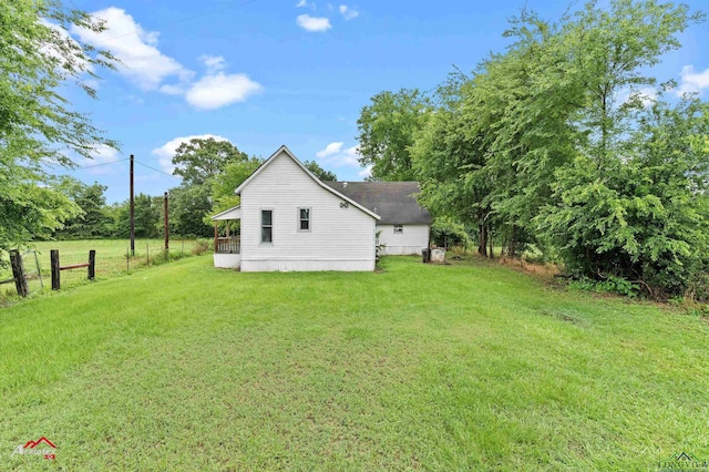 154 County Rd 117, Carthage, TX 75633 - view of green lawn