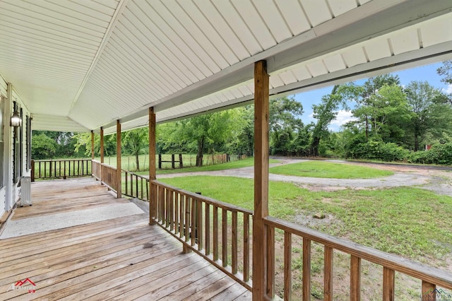 154 County Rd 117, Carthage, TX 75633 - porch featuring a yard