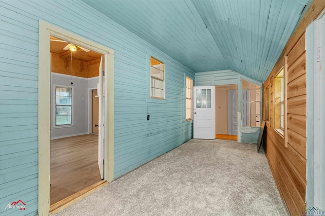 154 County Rd 117, Carthage, TX 75633 - unfurnished sunroom with vaulted ceiling