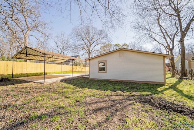 exterior space with a yard, a patio area, and fence