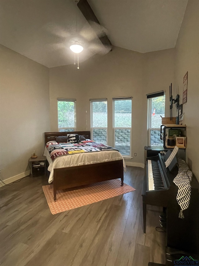 bedroom featuring hardwood / wood-style floors and ceiling fan