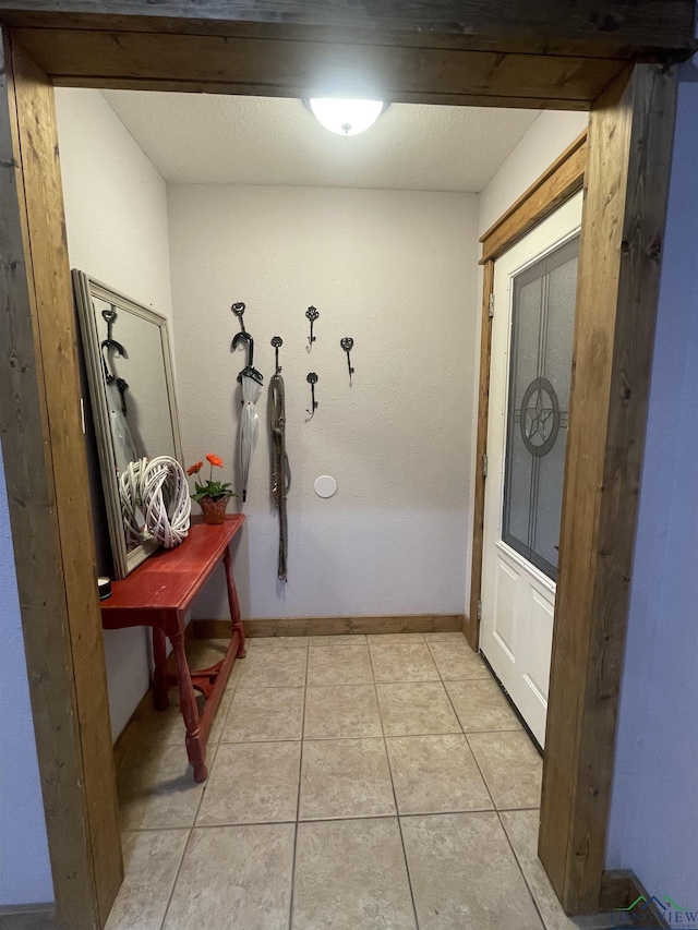 interior space with light tile patterned floors