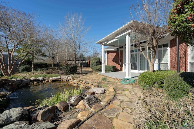 view of yard with a patio area