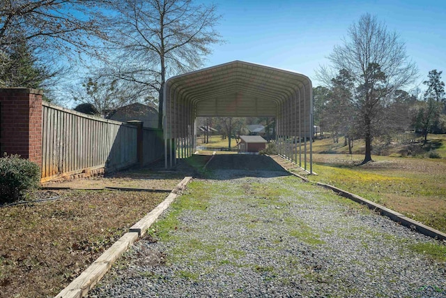 view of vehicle parking featuring a carport