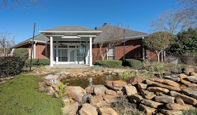 back of house featuring french doors