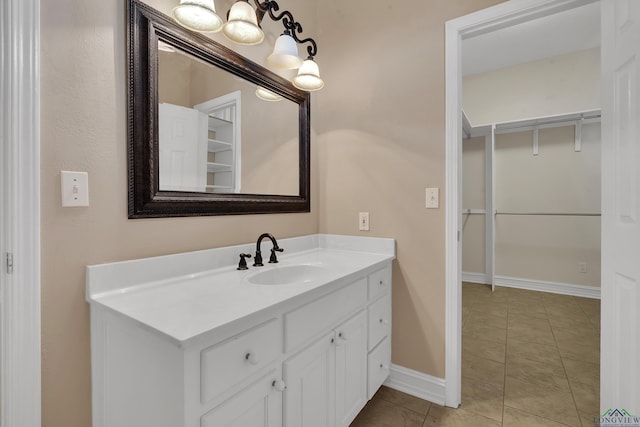 bathroom featuring tile patterned floors and vanity