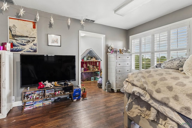 bedroom featuring dark hardwood / wood-style floors