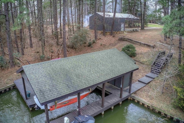 view of dock with a water view and boat lift