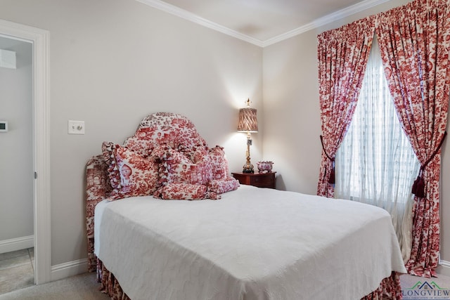 bedroom featuring multiple windows, ornamental molding, and carpet