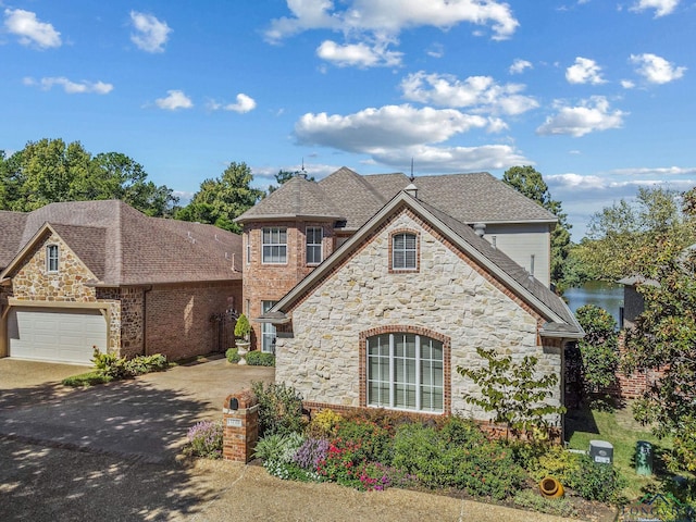 view of front of property with a garage