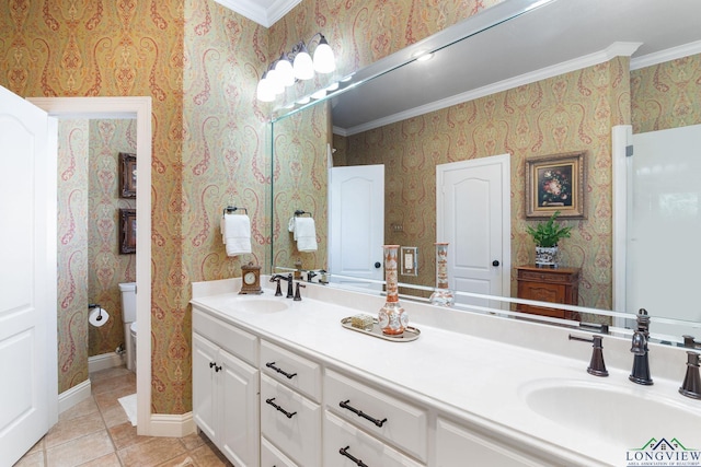 bathroom featuring tile patterned flooring, vanity, and ornamental molding