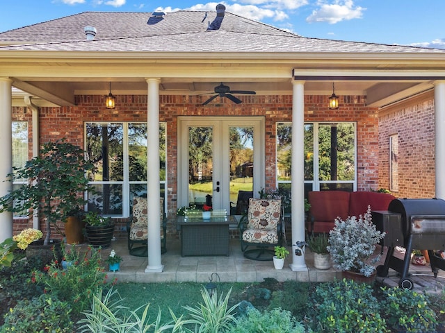 view of patio featuring area for grilling, ceiling fan, and french doors