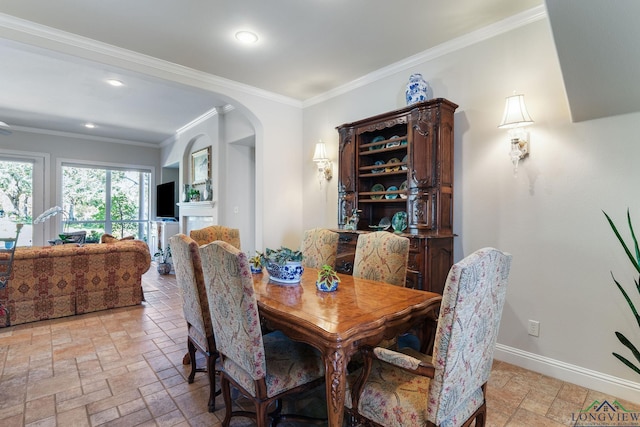 dining room featuring ornamental molding