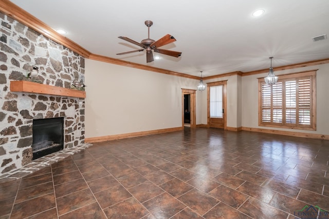 unfurnished living room with ornamental molding, a fireplace, ceiling fan, and visible vents
