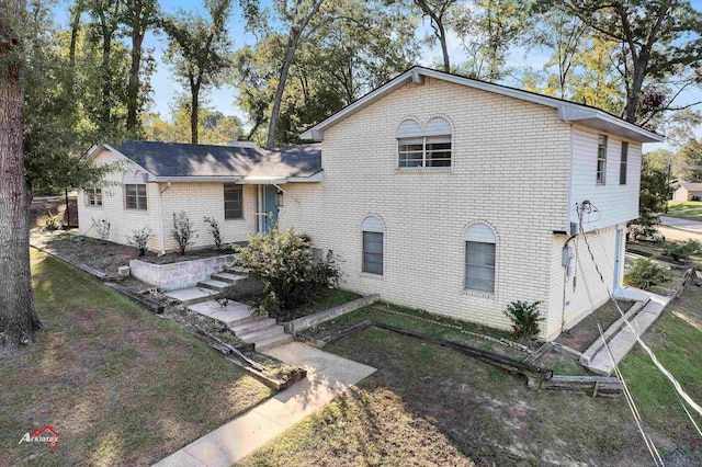 exterior space with a front yard