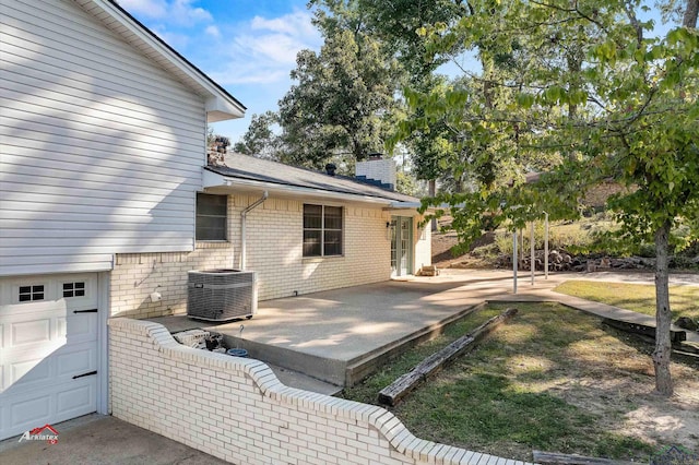 view of patio / terrace with a garage