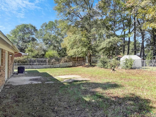 view of yard featuring central AC