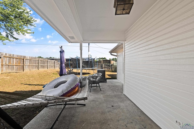 view of patio with a trampoline